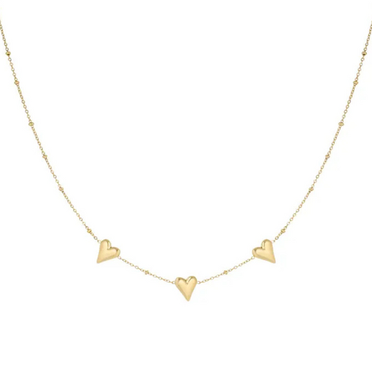 Gouden ketting met drie hartjes