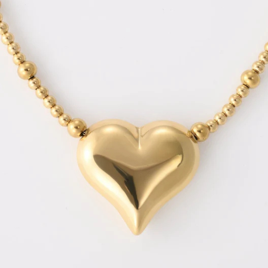 Goudkleurige ketting met hart